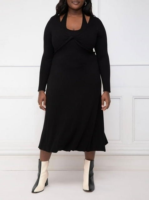 model wearing the black sweater dress