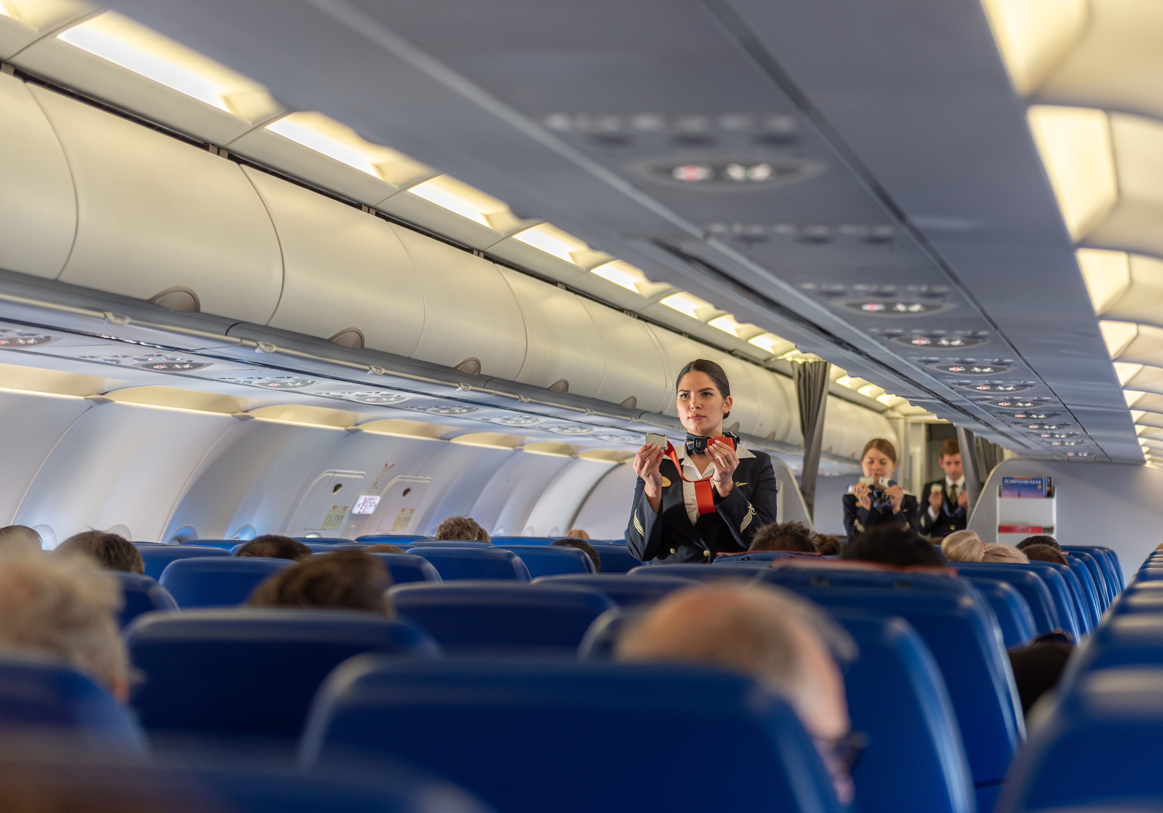 Rome, Italy - October 23, 2019: Aeroflot Russian Airlines Cabin Crew Safety Demonstration in airplane before departure.