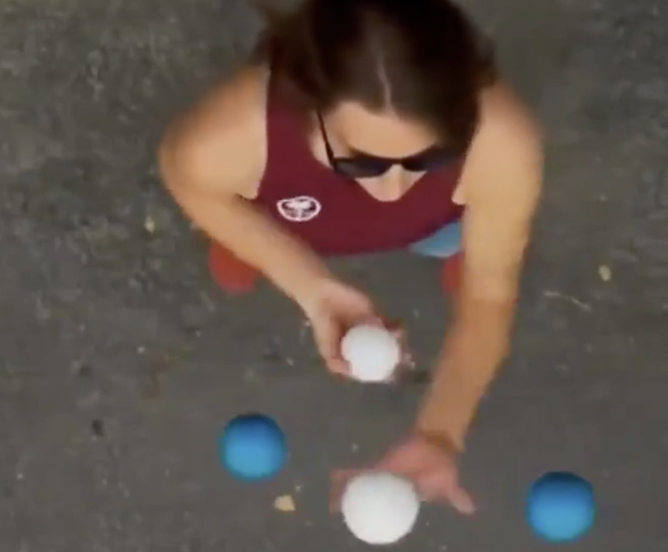 aerial view of a woman juggling