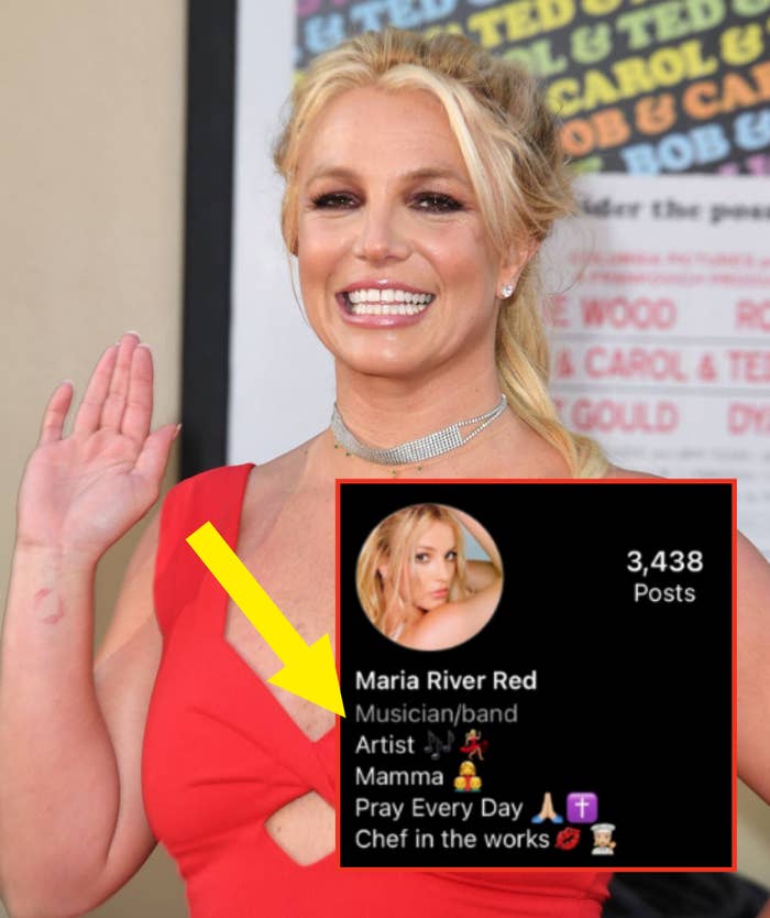 A smiling Britney waving atan event