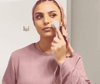 a gif of a model using the brush