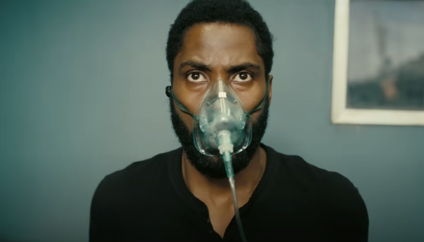 John David wearing an oxygen mask in Tenet