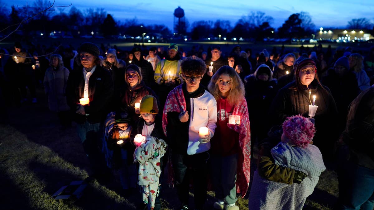 A 17-year-old opened fire at a small-town Iowa high school before classes resumed on the first day after the winter break, killing a sixth-grader and wounding five others Thursday as students barricaded in offices, ducked into classrooms and fled in panic.