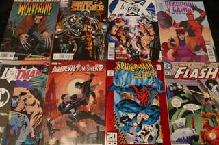 assortment of different comic books