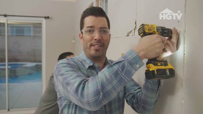 One of the brothers from &quot;Property Brothers&quot; is drilling into a wall
