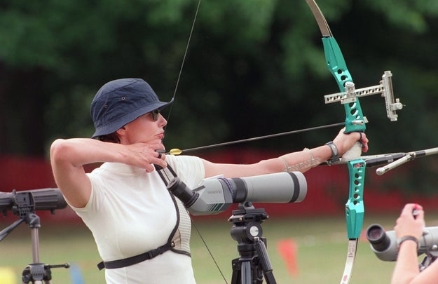 Geena Davis with a bow and arrow