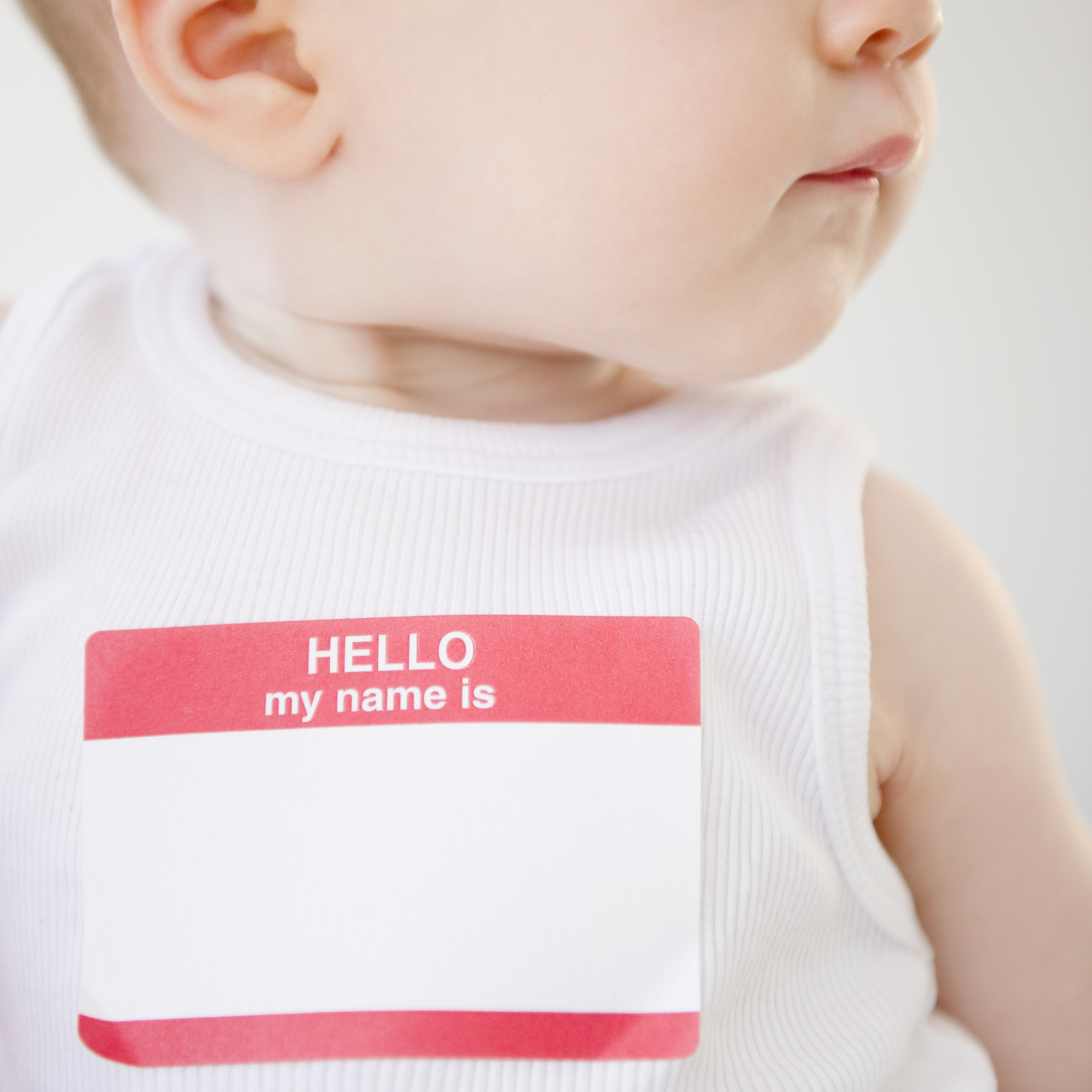baby with a blank name tag