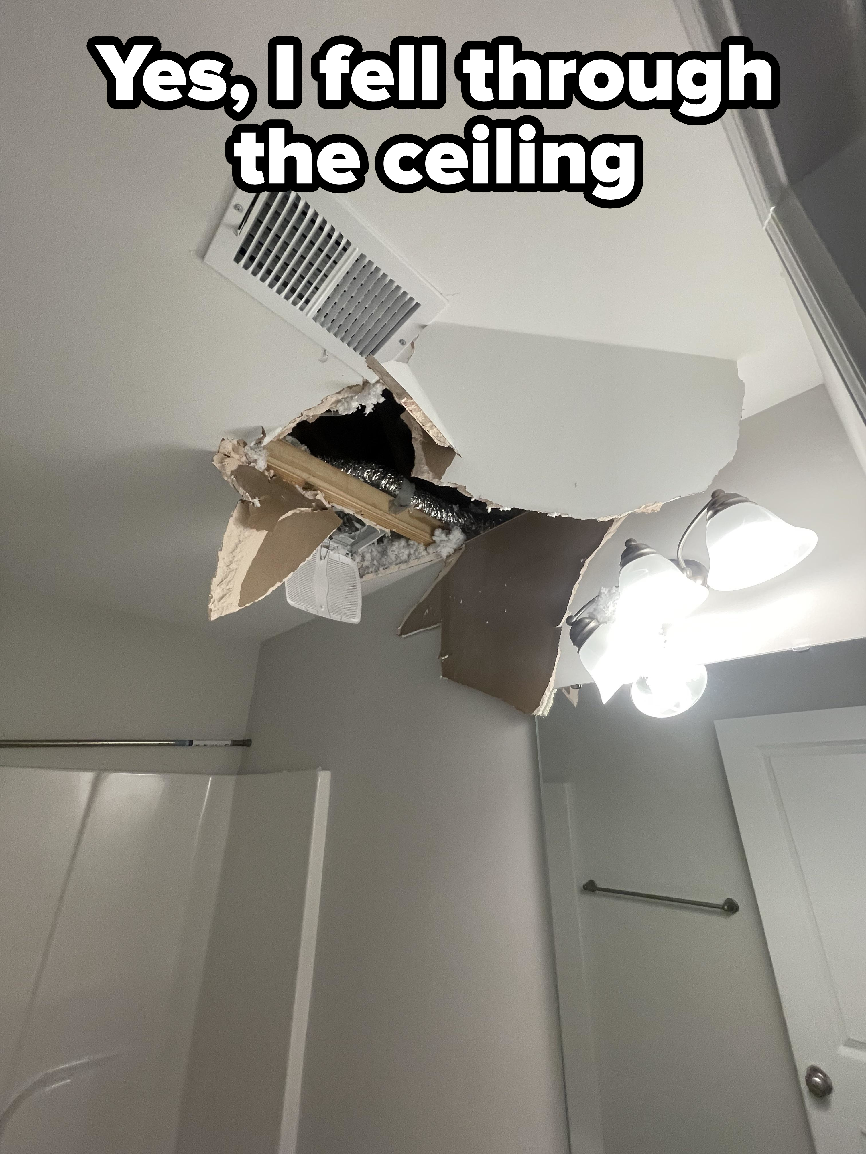 A huge hole in the ceiling with &quot;Yes, I fell through the ceiling&quot; caption