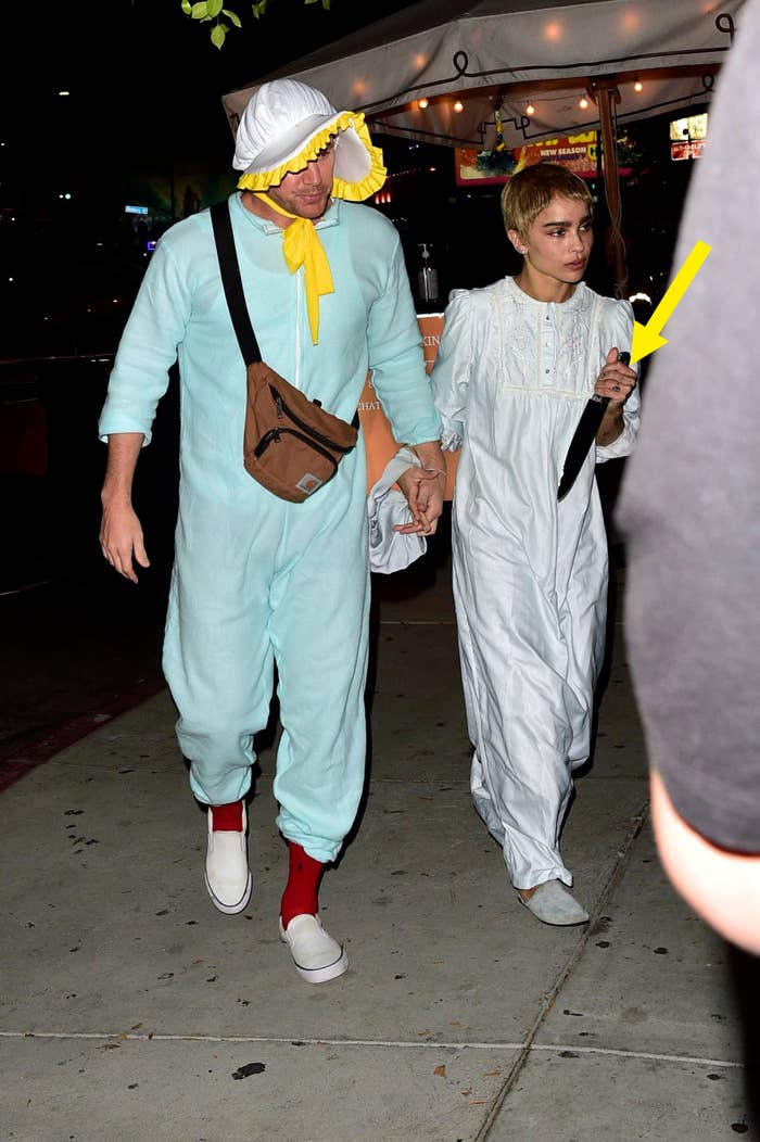 zoe and channing holding hands on the way to a halloween party