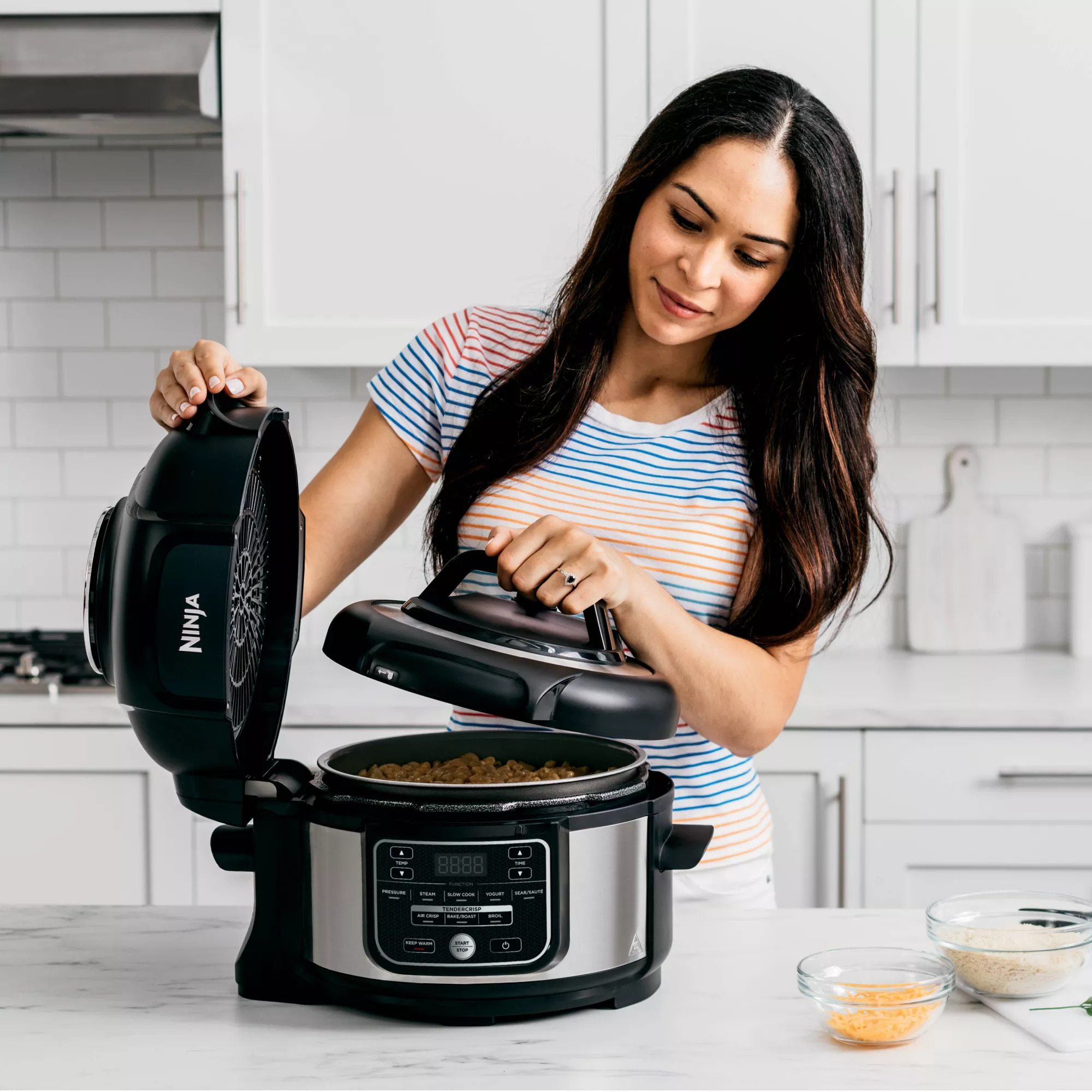 A model using the cooker with the included pressure lid
