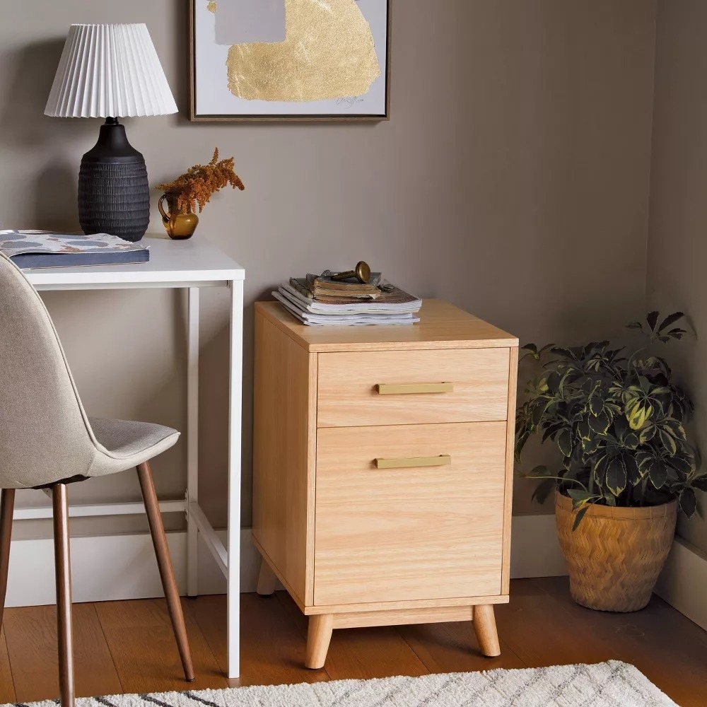 the wooden filing cabinet in a home office