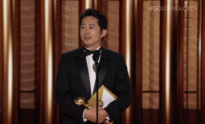 Steven Yeun accepting his Golden Globe