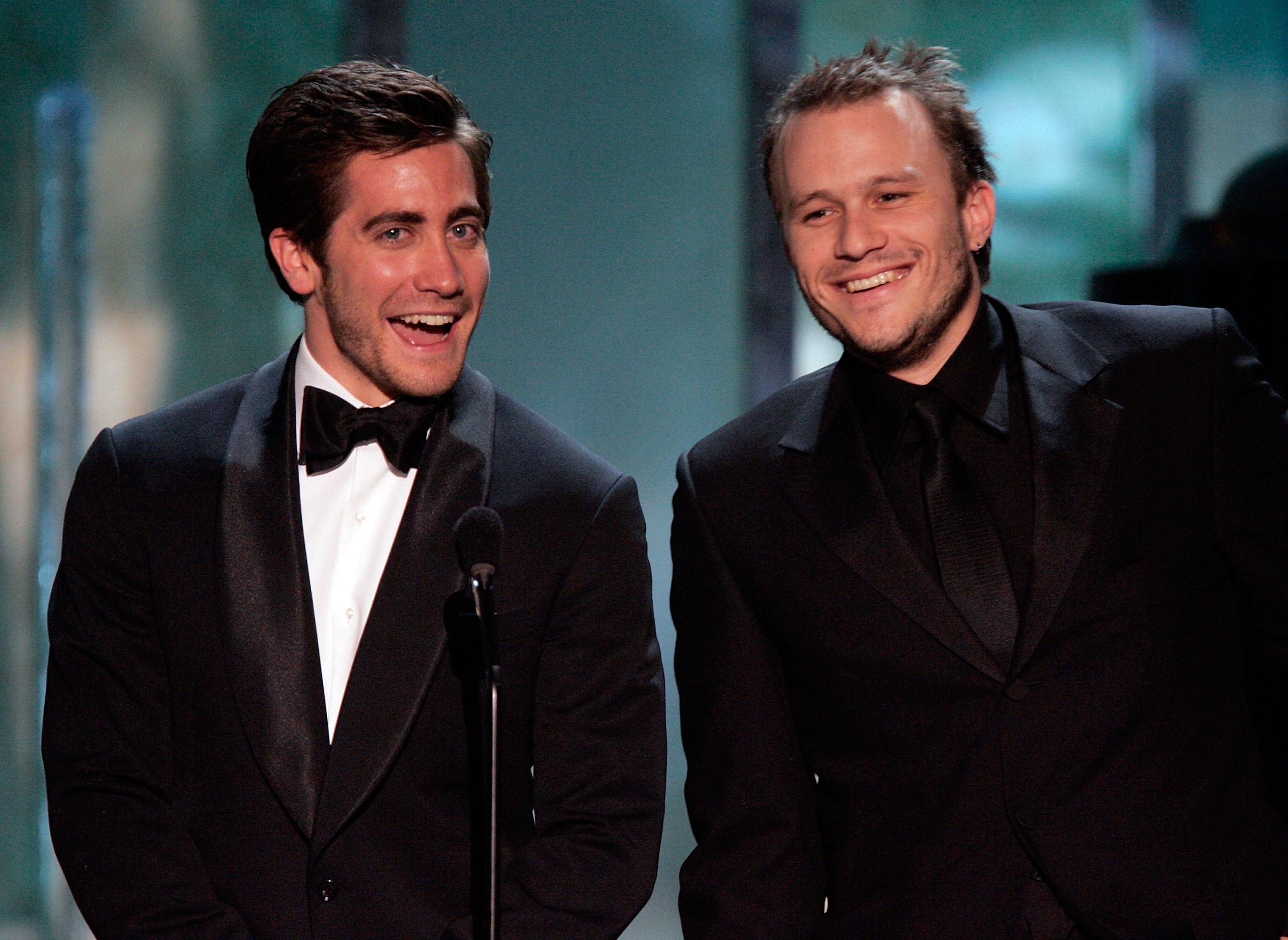 Jake Gyllenhaal and Heath presenting onstage
