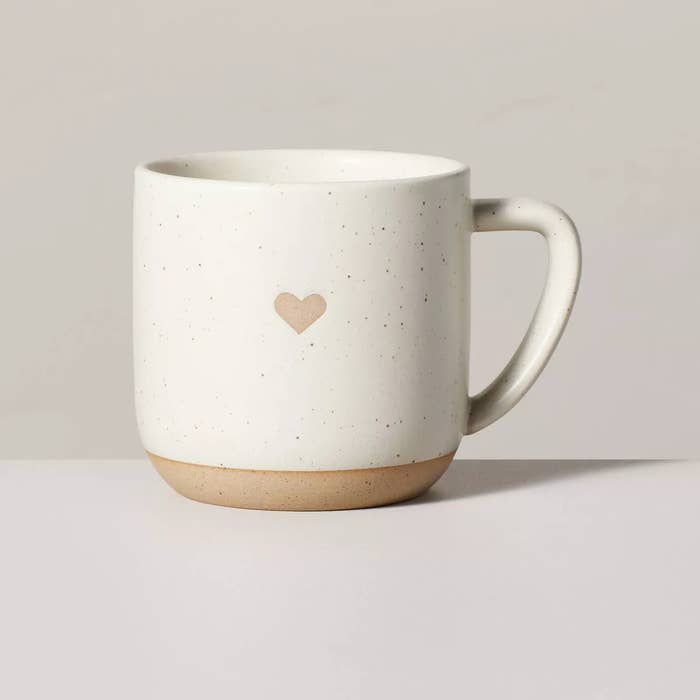 the mug with a small heart on the front