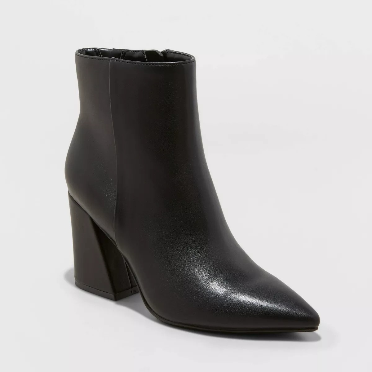 black faux leather pointed toe boots