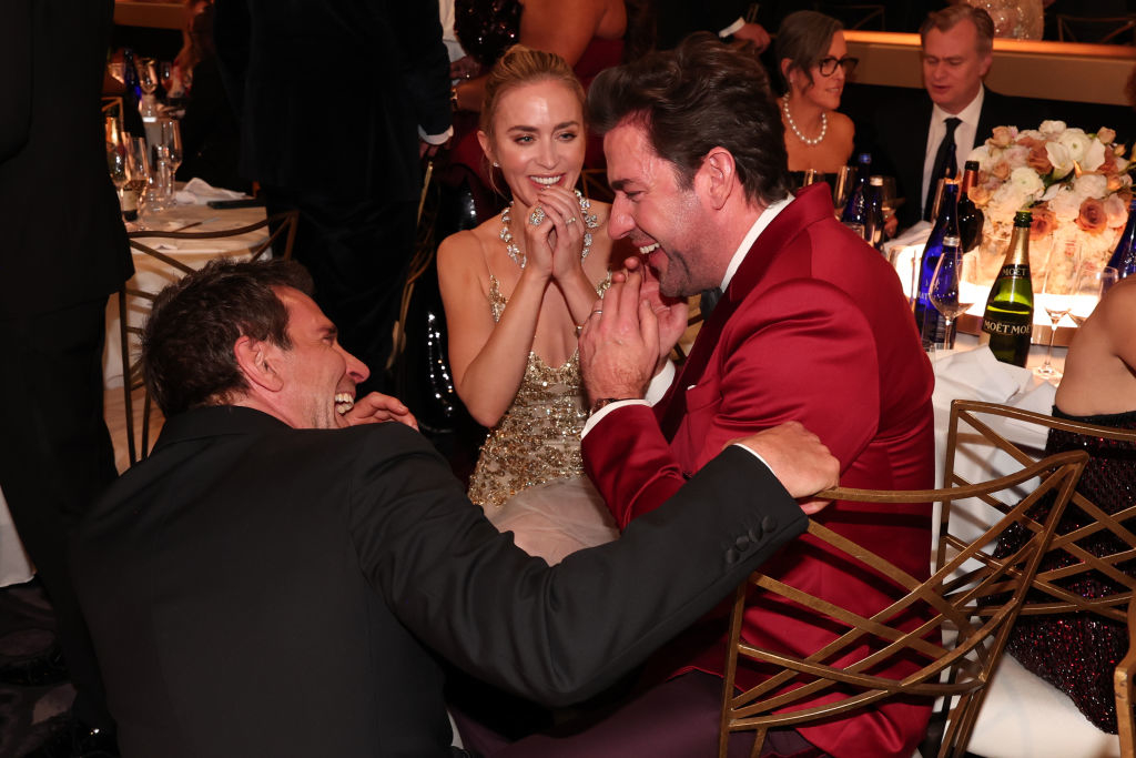 Bradley Cooper, Emily Blunt, and John Krasinski laughing