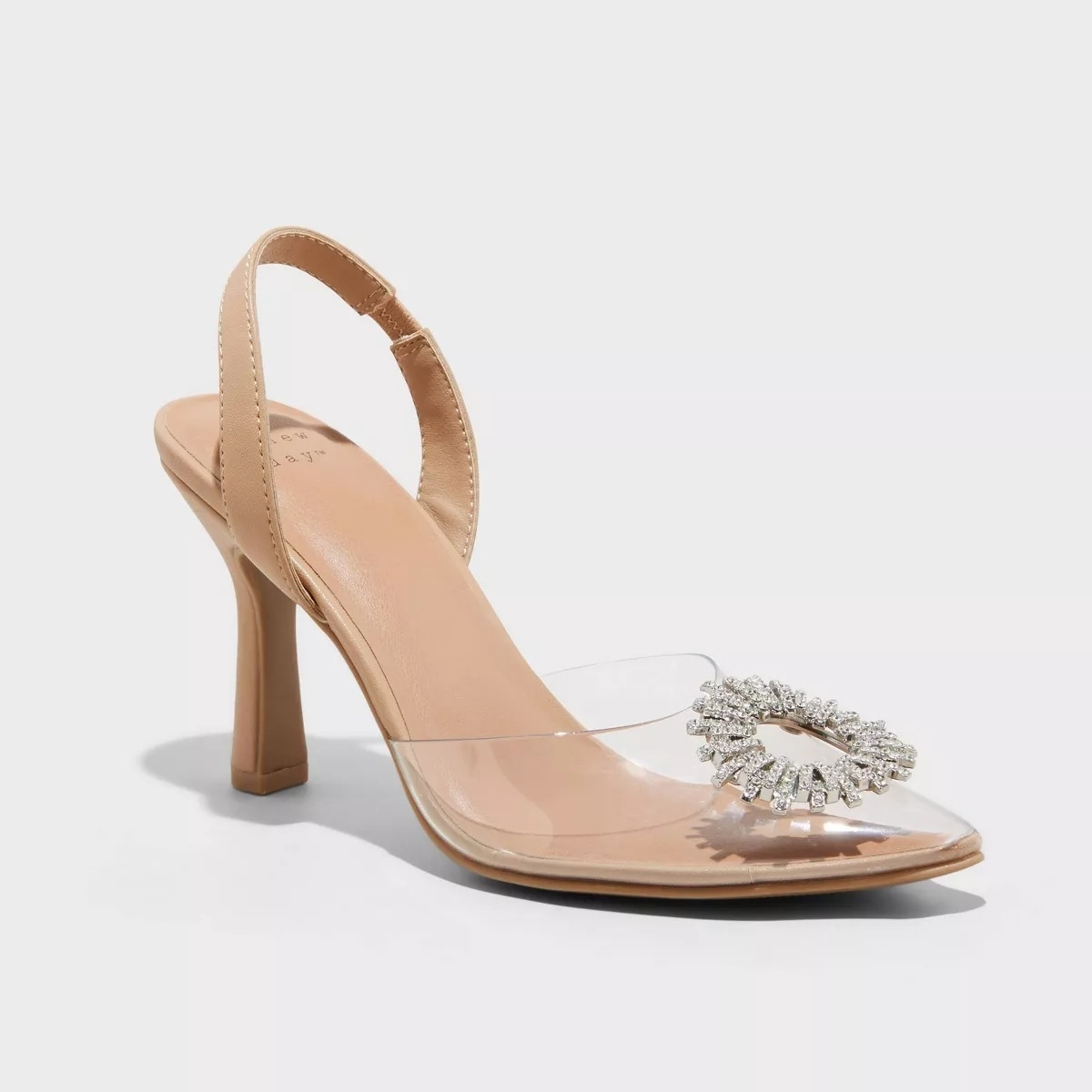 beige heel with clear toe and sparkly embellishment on toe