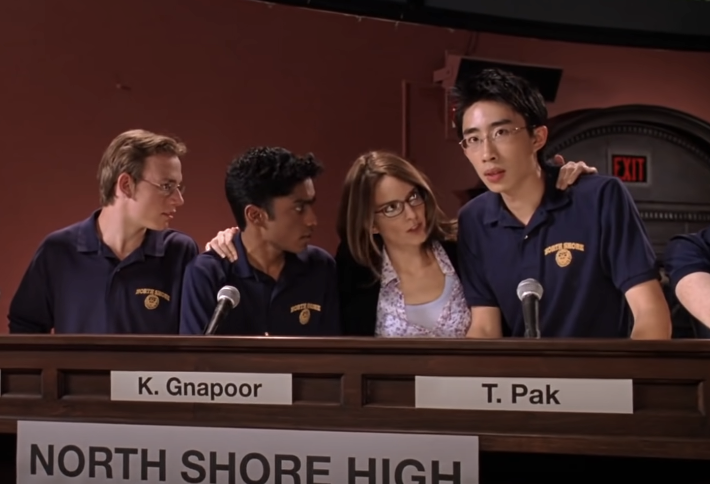 he's part of the mathletes, standing behind a podium