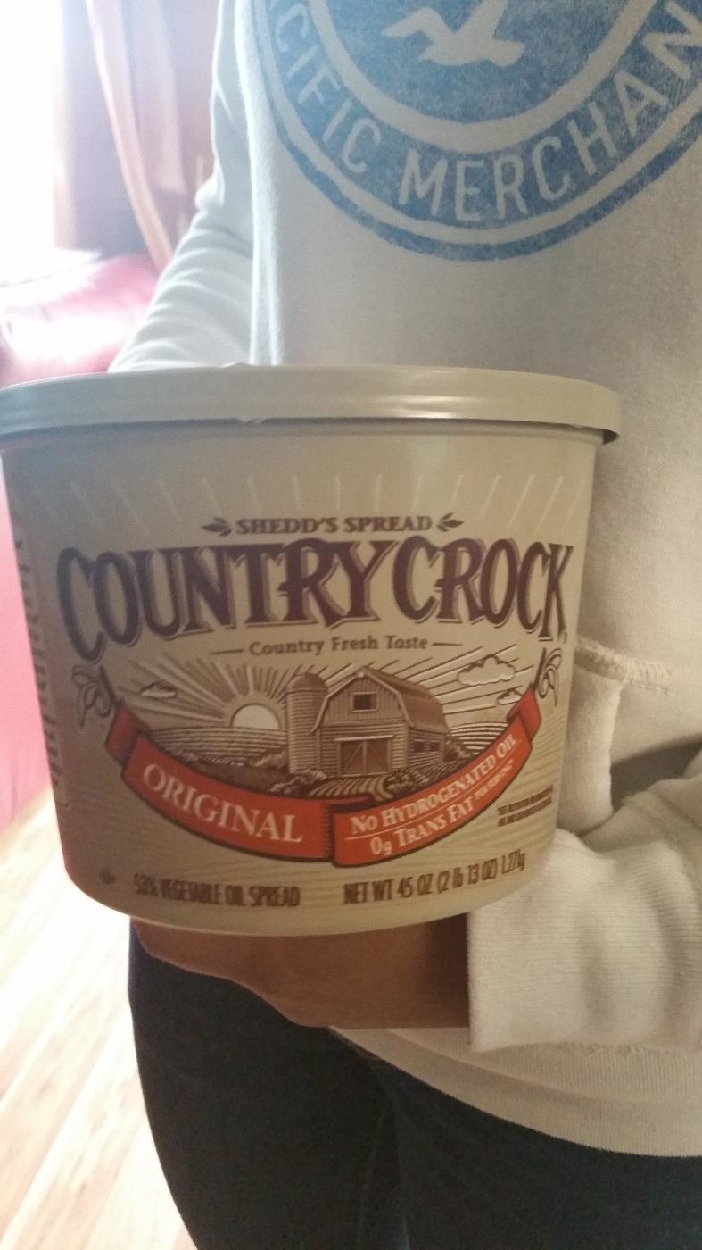 A large plastic Country Crock tub