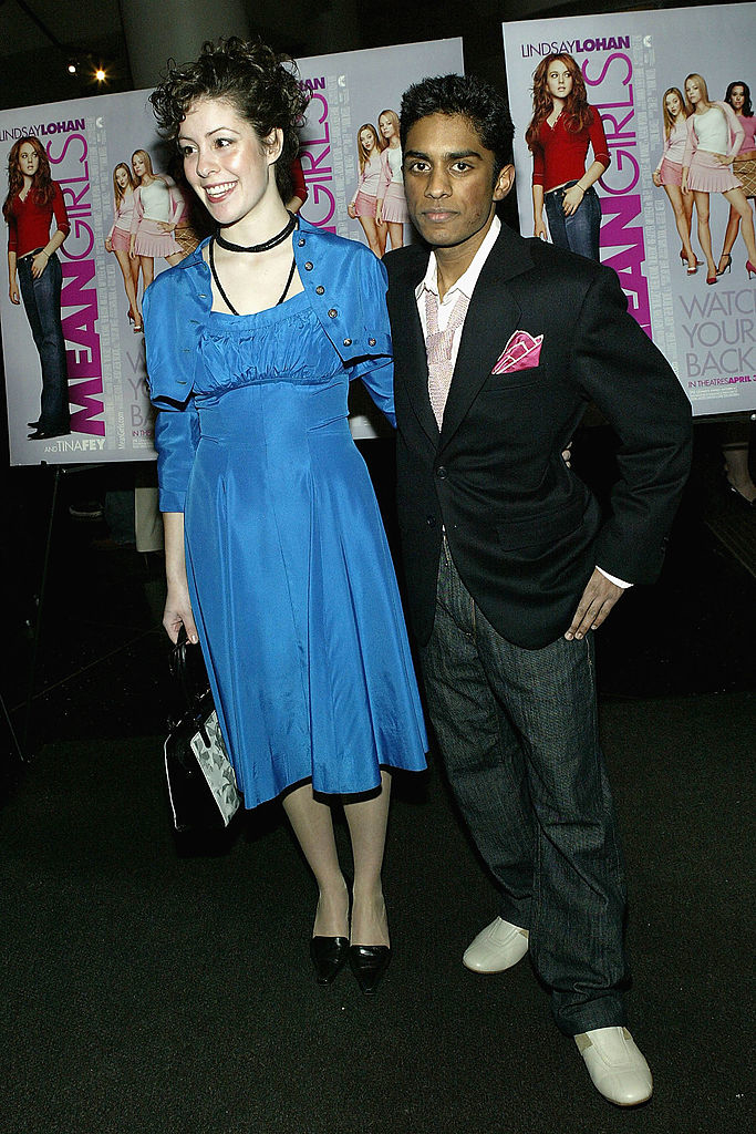 he's in jeans and a blazer