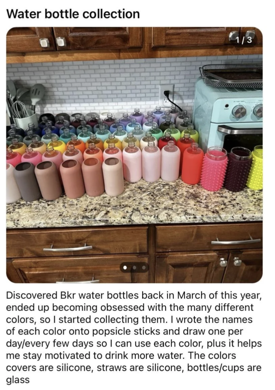 A kitchen counter with an array of water bottles with silicone covers in different colors: &quot;Discovered Bkr water bottles back in March, ended up becoming obsessed with the many different colors, so I started collecting them&quot;