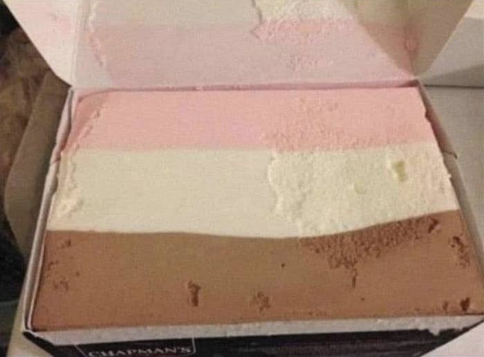 Boxed ice cream with strawberry, vanilla, and chocolate strips