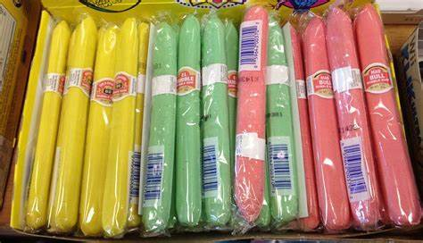Pastel-colored candy cigars in a box