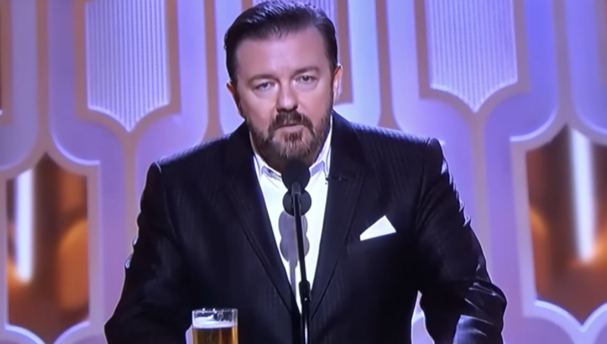 Closeup of Ricky Gervais onstage