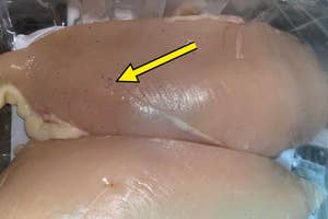 a package of raw chicken breasts