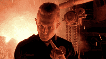 GIF. T-1000 shakes his finger.