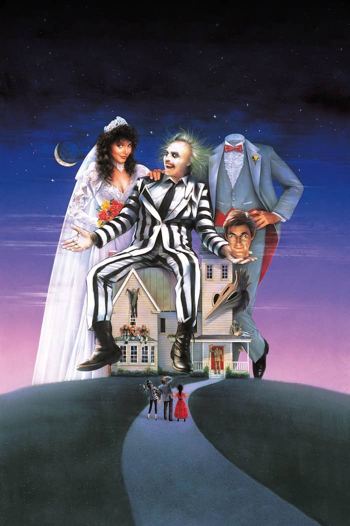 the movie poster with beetlejuice sittng on a house