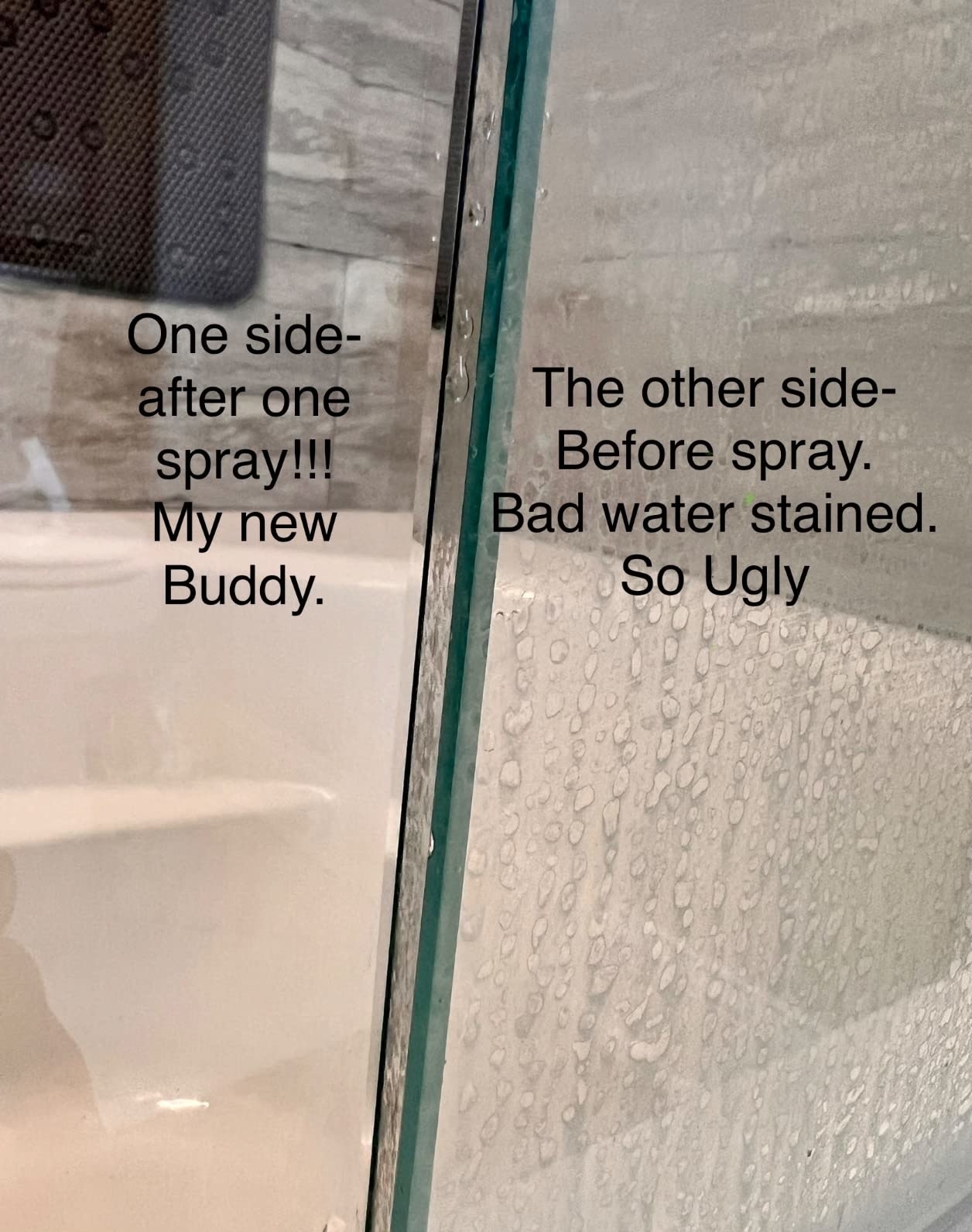 Half of a reviewer&#x27;s glass shower door with water stains, half without