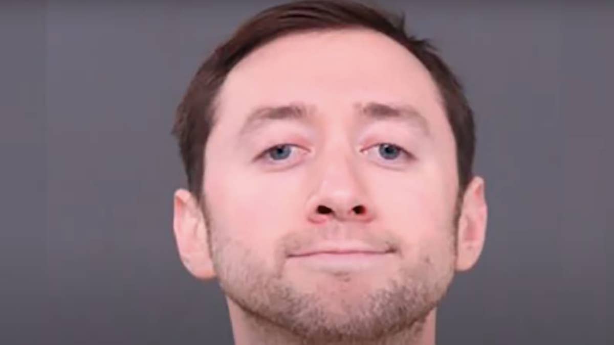 The man, identified as 32-year-old Justin Mohn, is alleged to have shown his father's head in a video that remained viewable on YouTube for several hours.