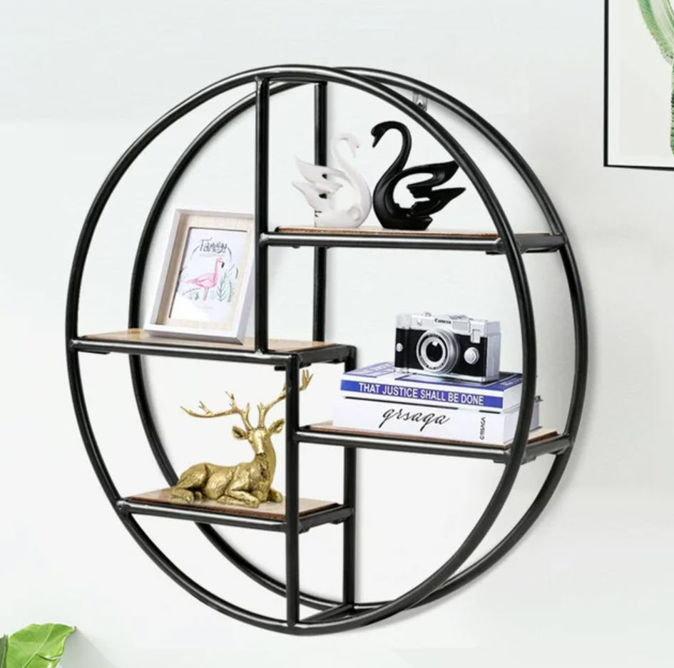 circular shelf wall hanging with decor and frames