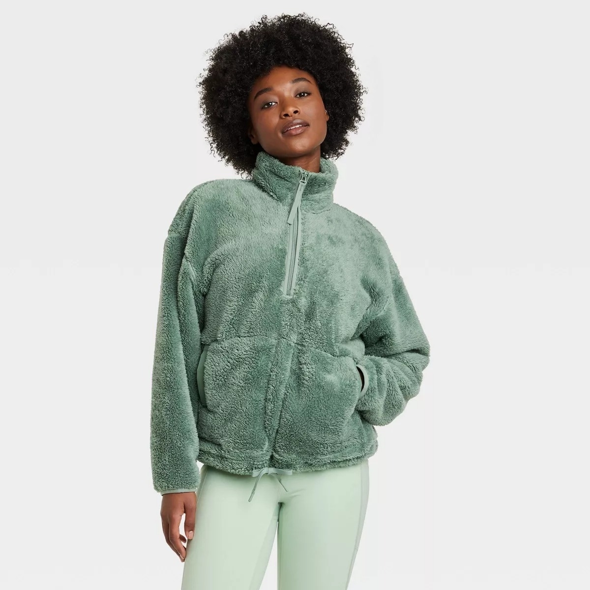 green fleece pullover quarterzip on mode;