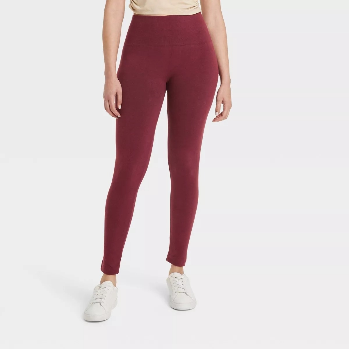 burgundy fleece lined leggings on model