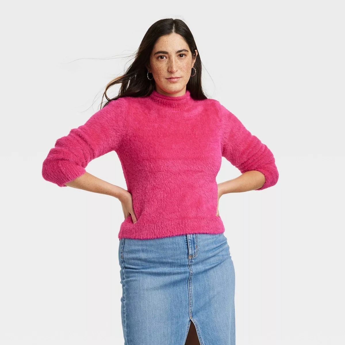 pink fuzzy sweater on model