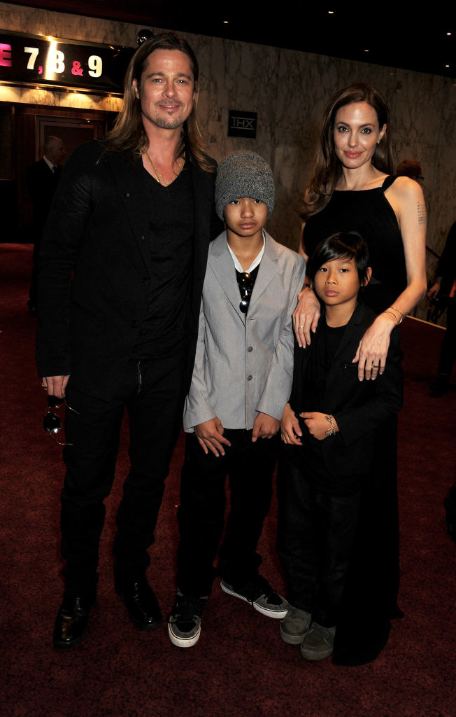 brad and angelina with pax and maddox on the red carpet