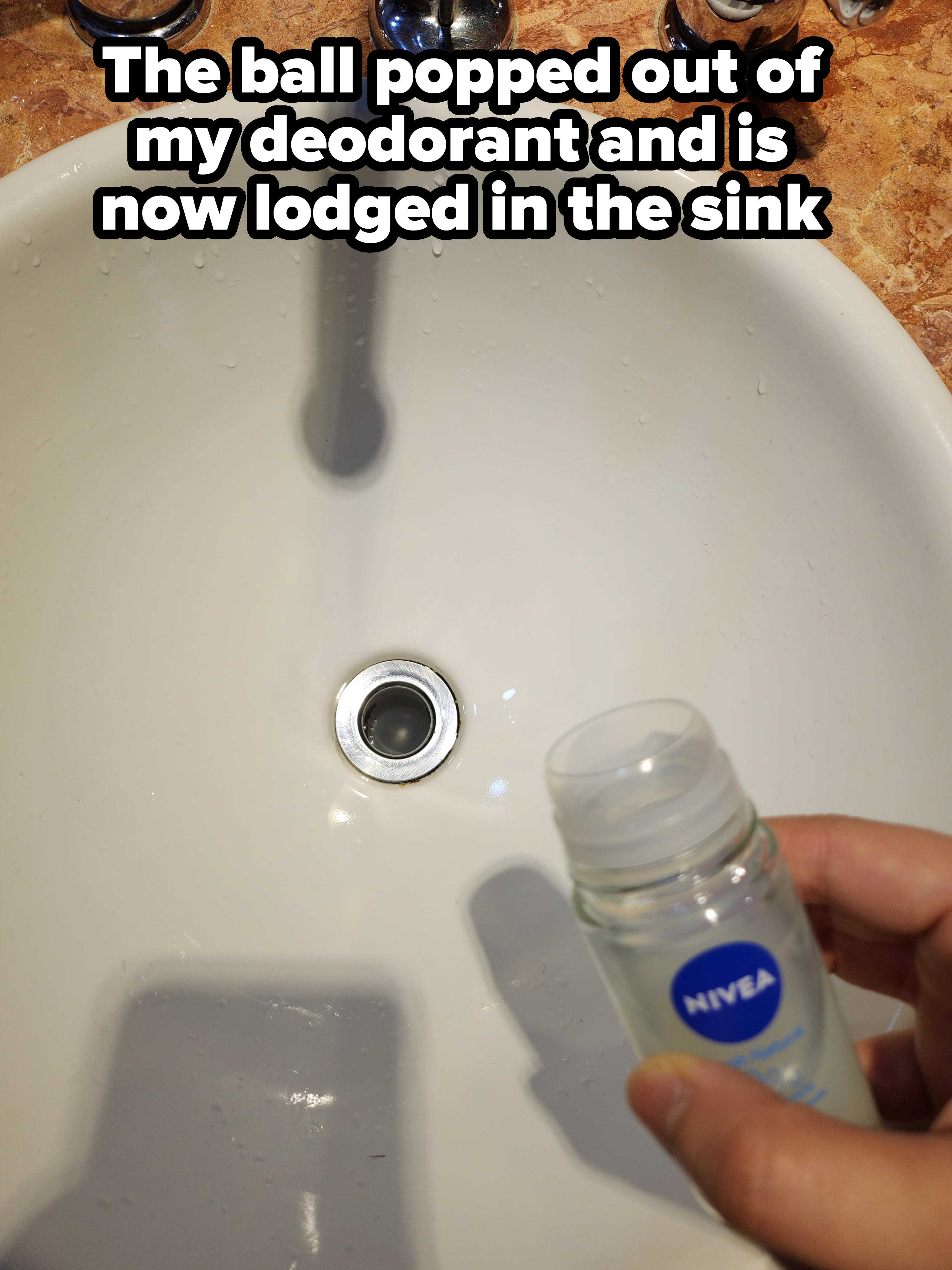 The ball of a roll-on deodorant stuck in the sink hole