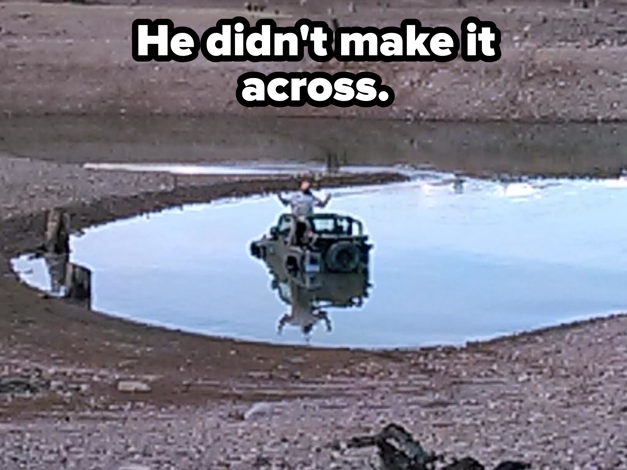A person in a car in the middle of a body of water
