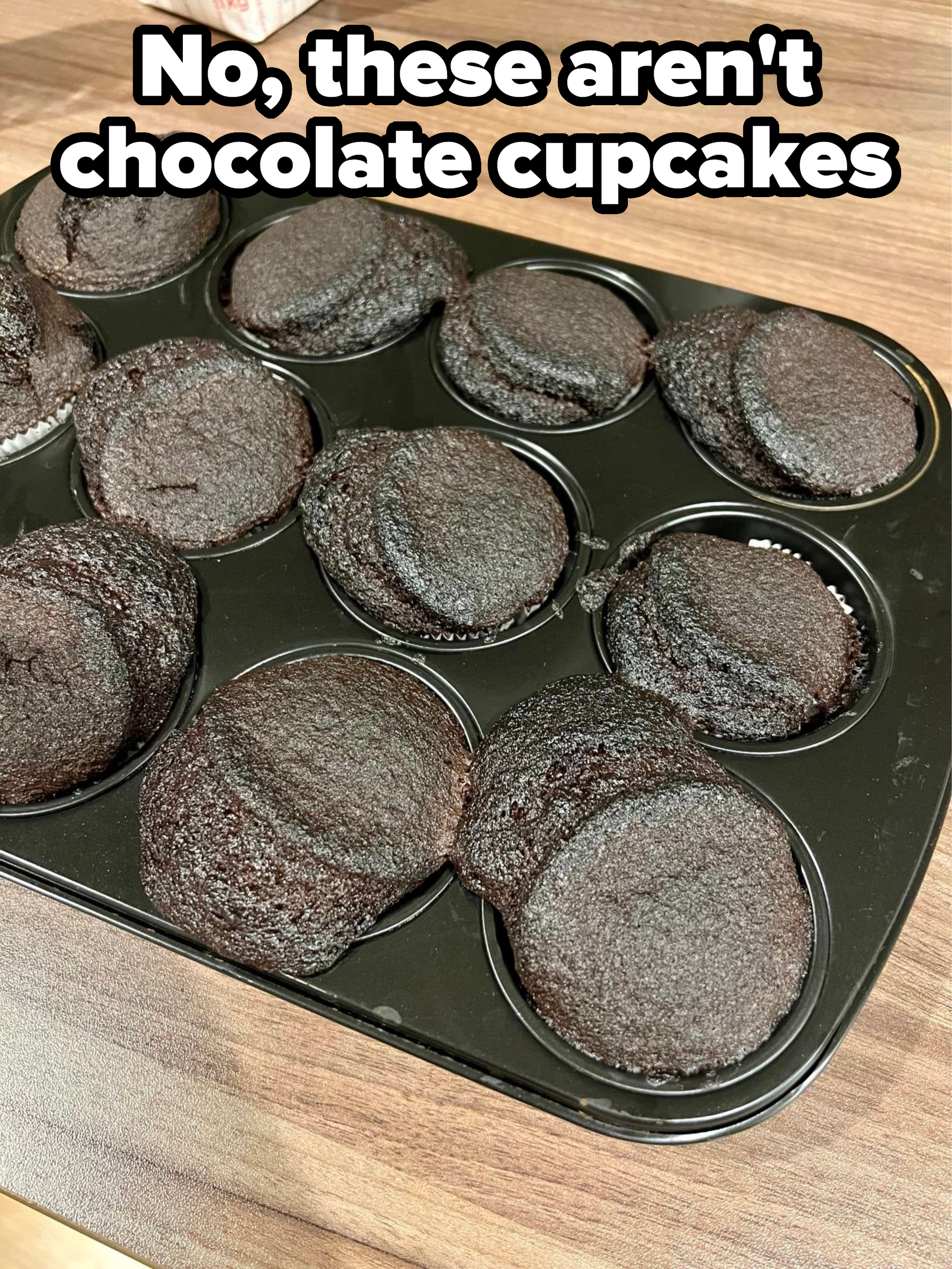 Burnt cupcakes in a pan
