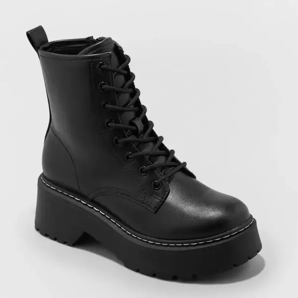 Black laced up combat boots.