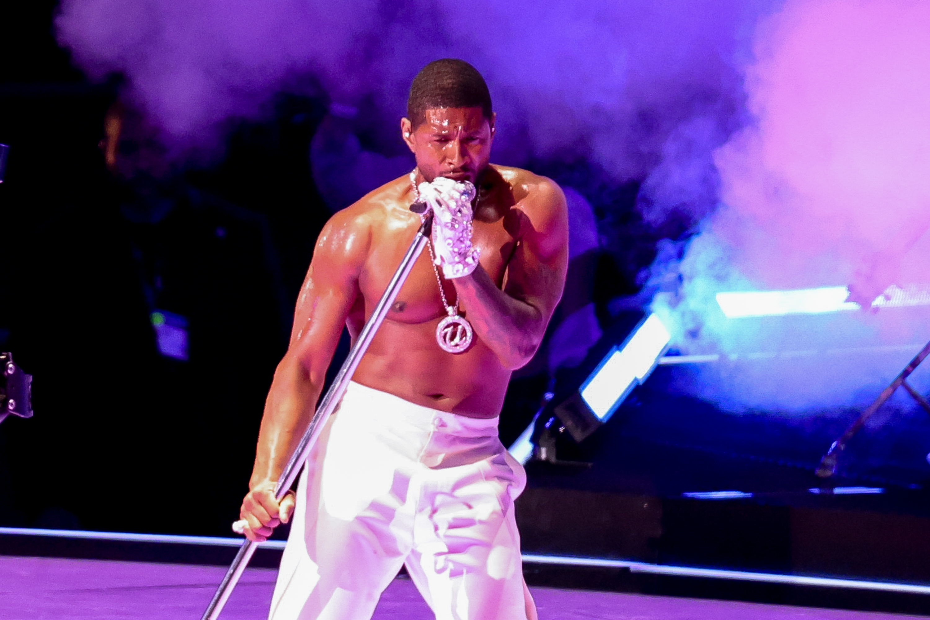 Bare-chested Usher performing at the halftime show