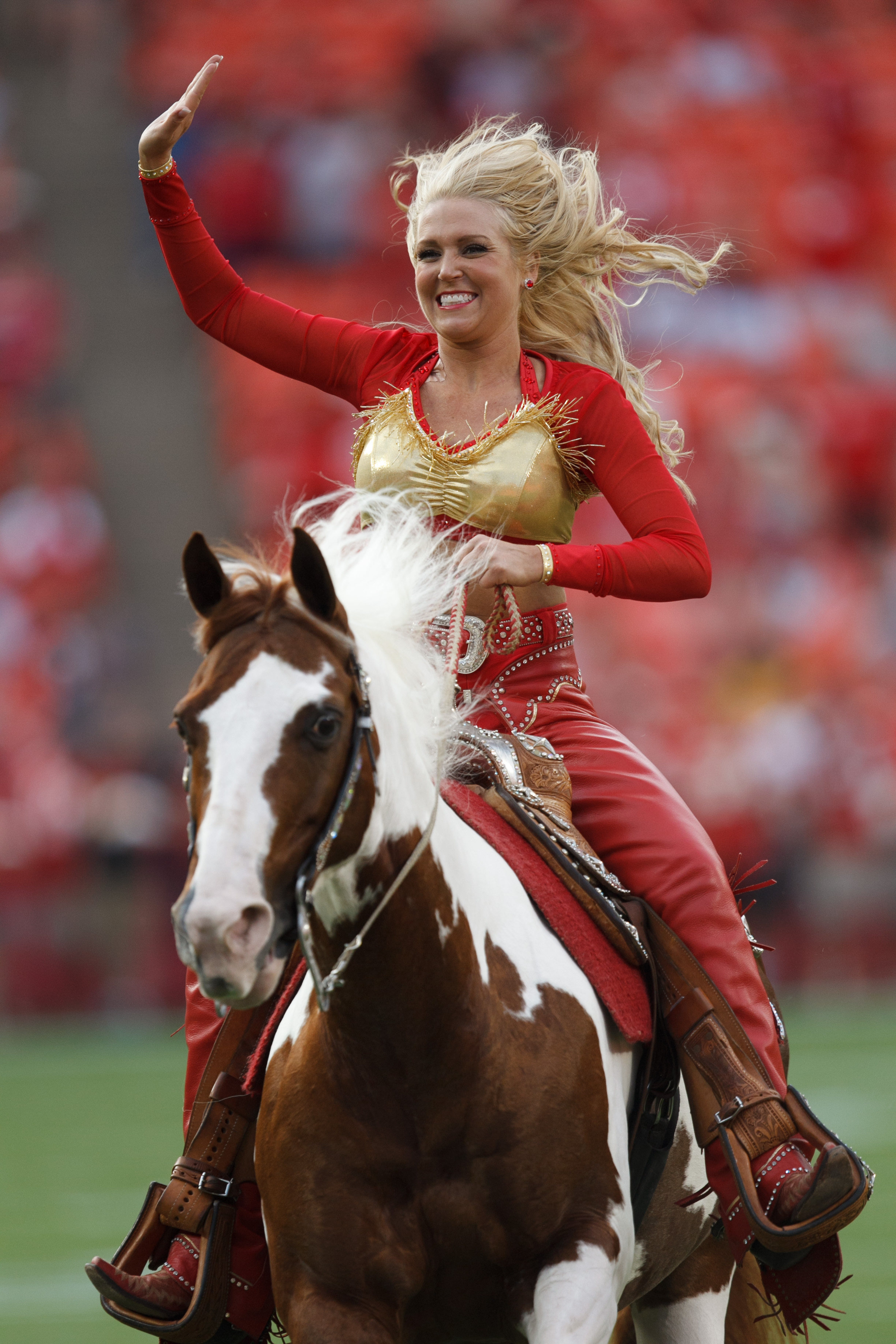 A Chiefs cheerleader on a horse