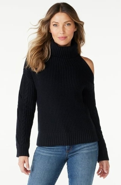 model wearing black cold shoulder sweater