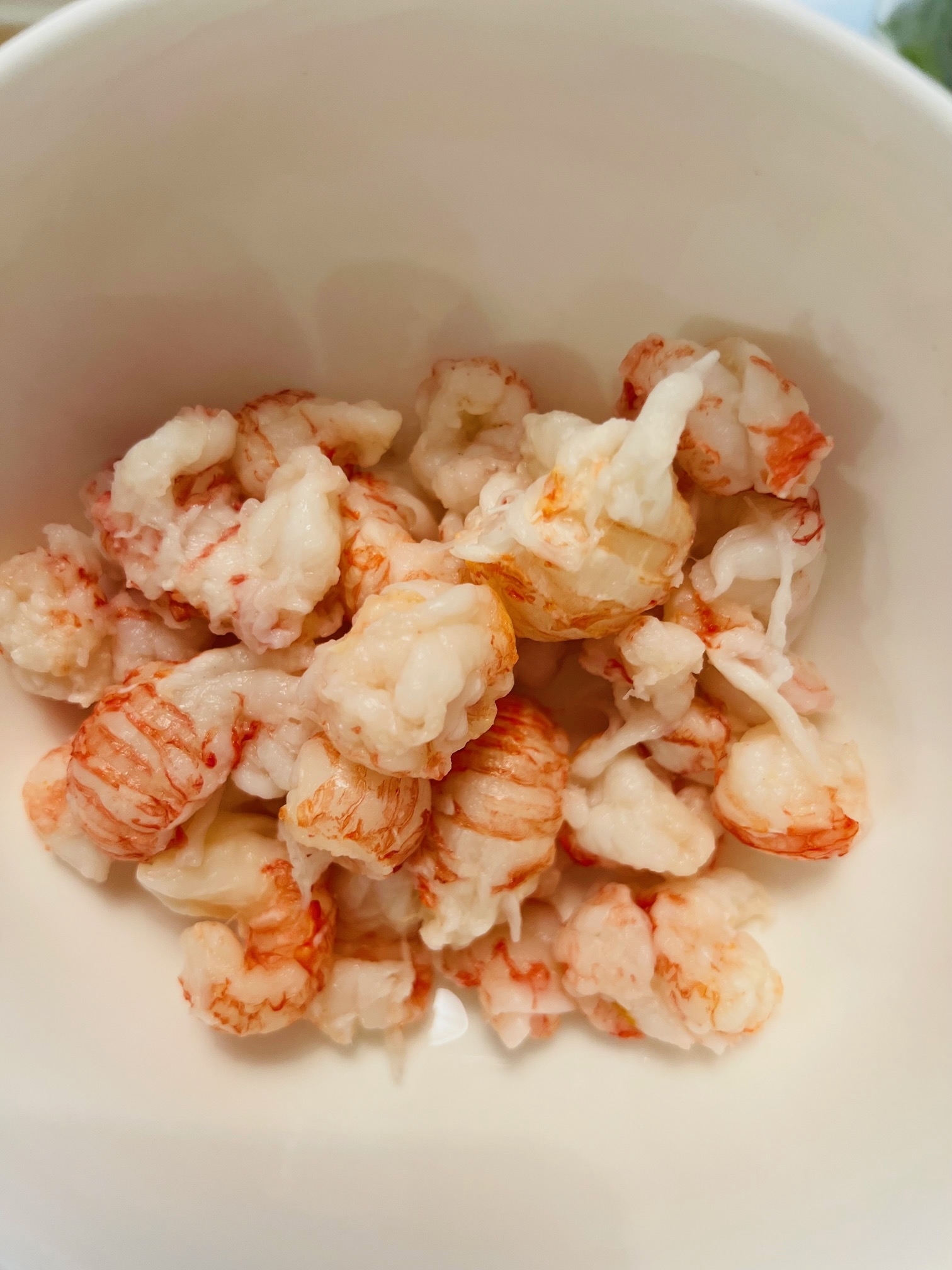 Thawed langostino meat in a bowl