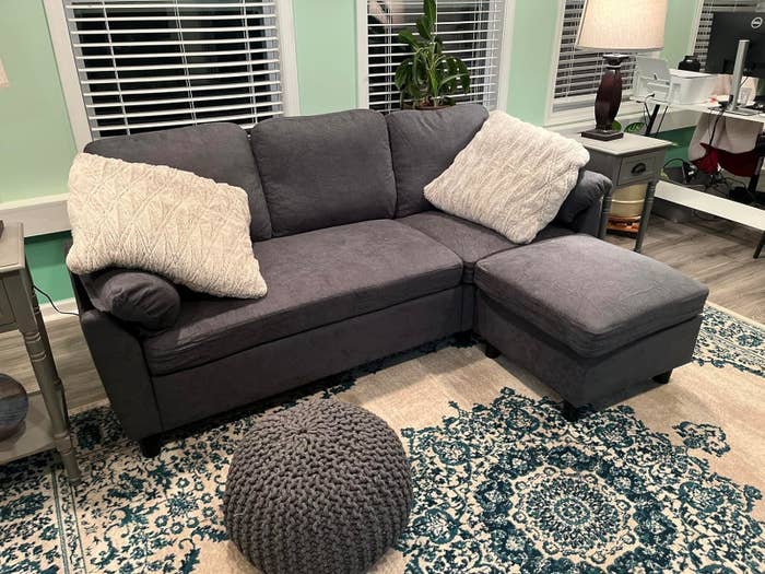 Reviewer&#x27;s small sectional in a living room