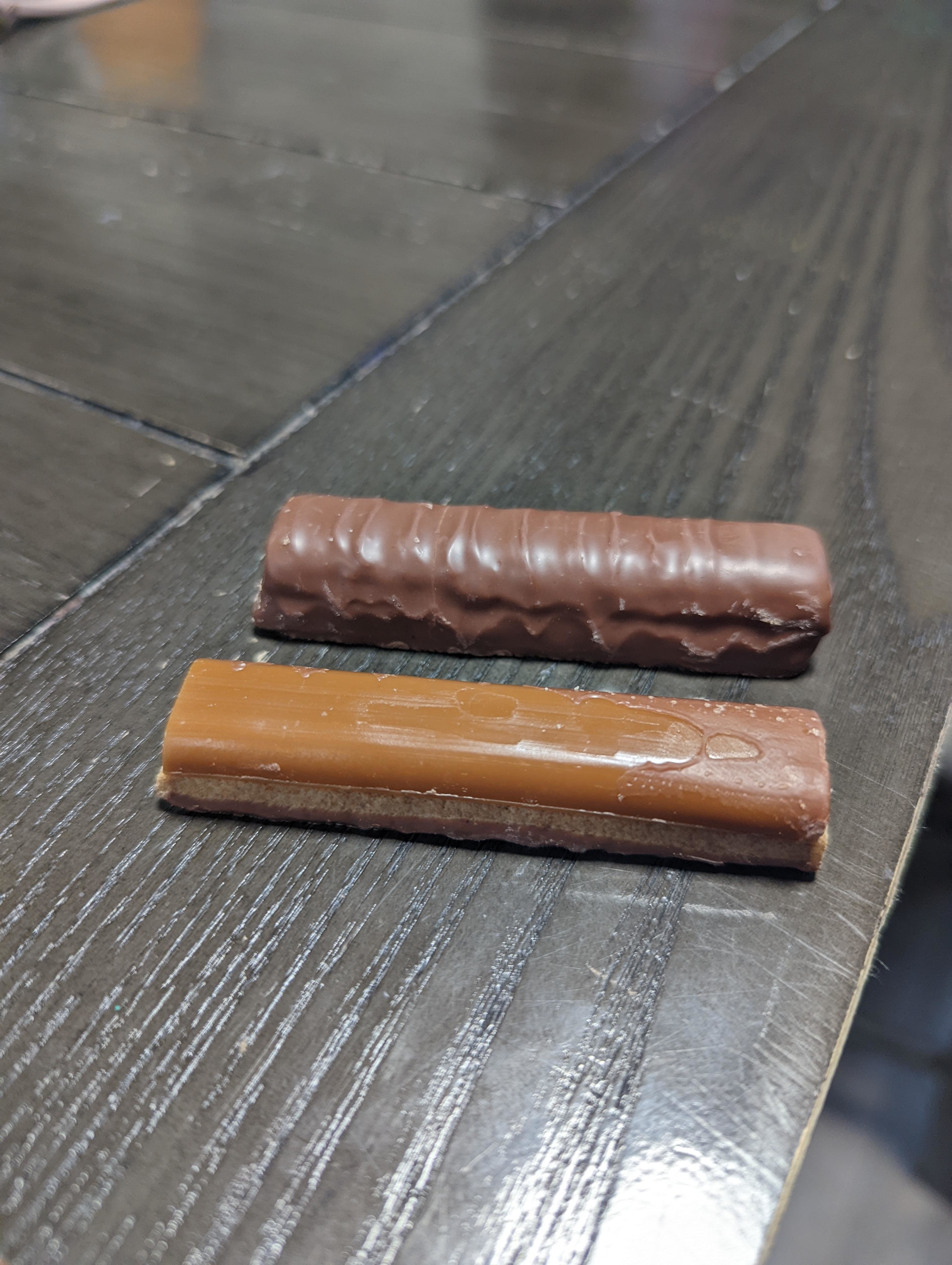 A Twix with the chocolate topping and one just with caramel