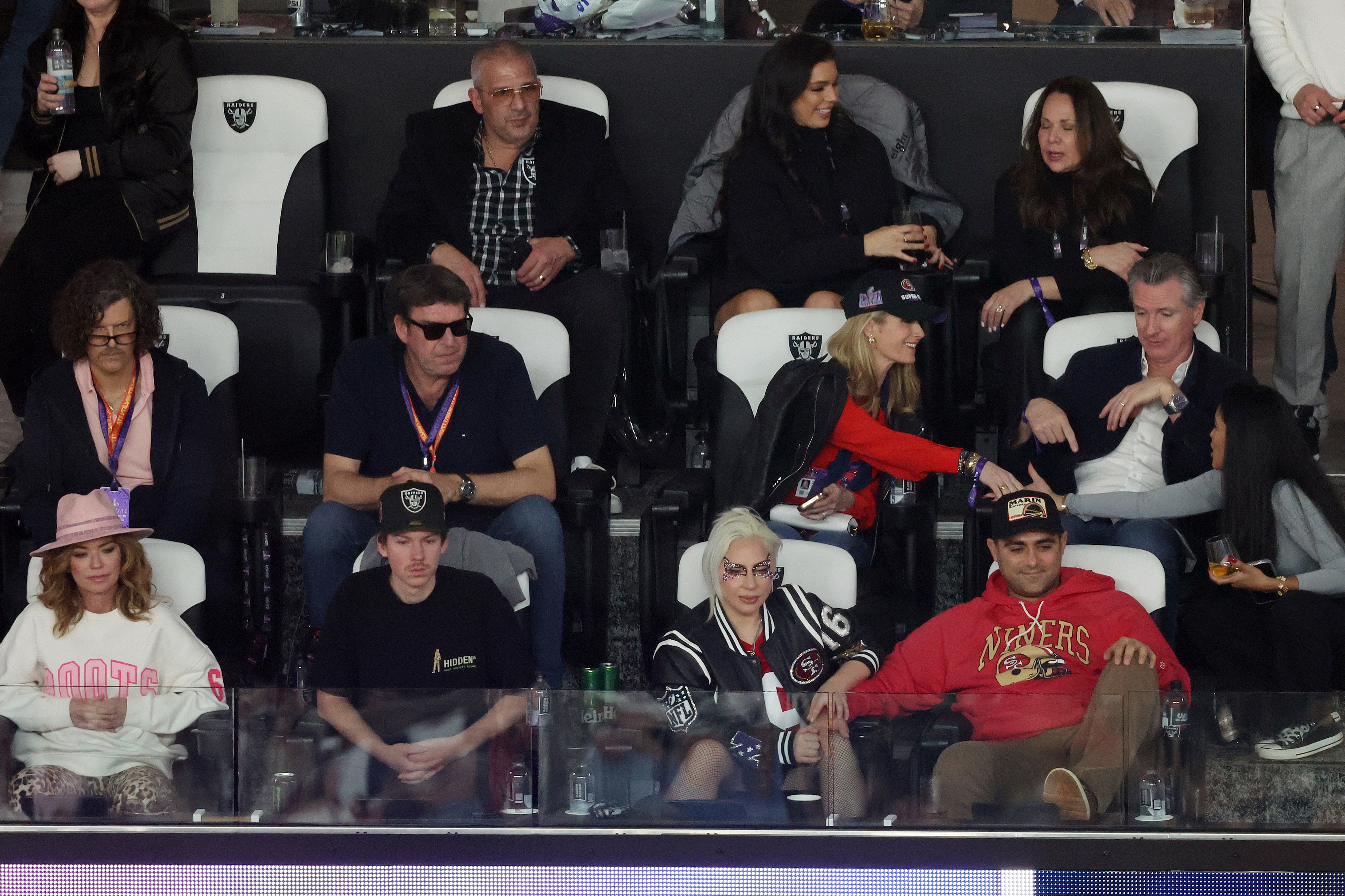 Gaga and Michael sitting in the stands