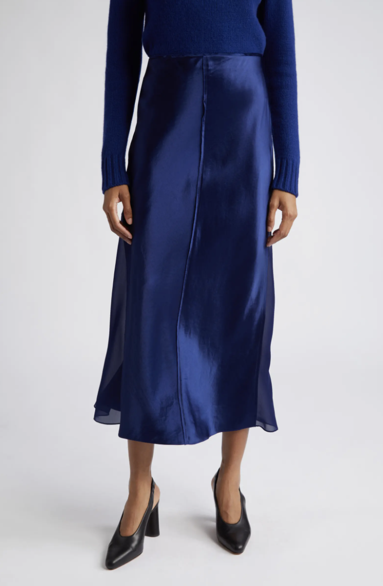 a model wearing the blue skirt